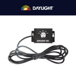 Daylight LED light controller and connecting cable on a white background